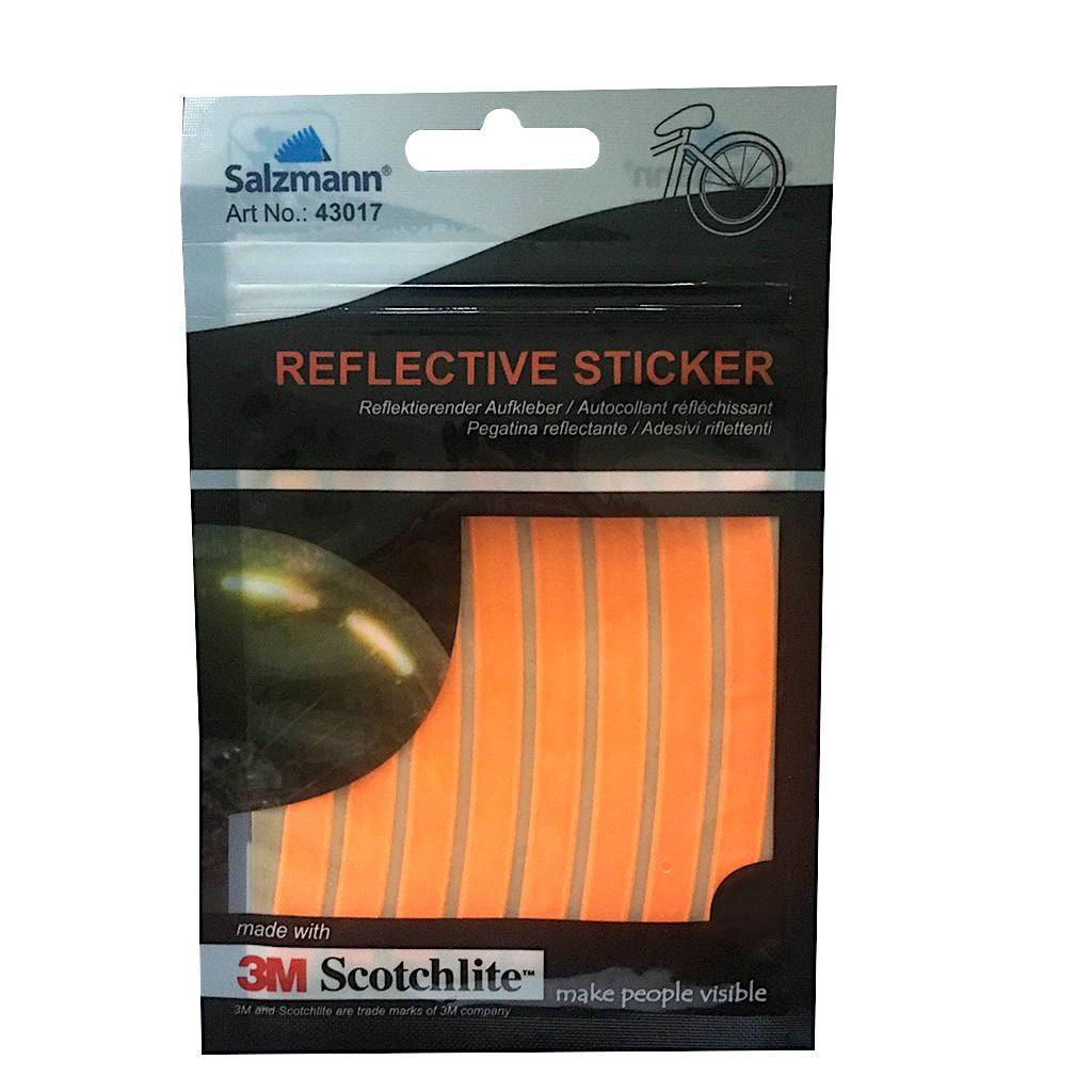 Image of orange reflective stickers in  packaging. 