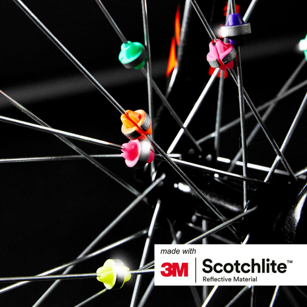 Close up image of colourful spoke beads attached to spokes.  