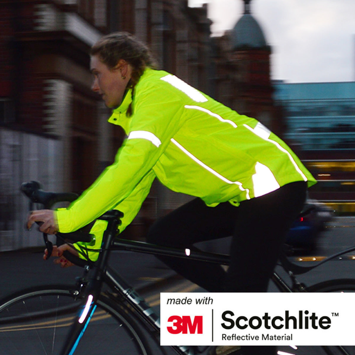 Image of person on bike wearing cycling jacket. 