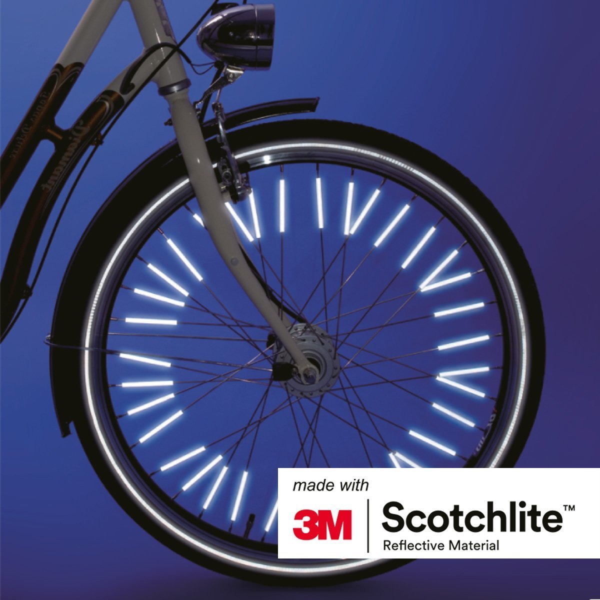 Image of bike wheel with spoke reflectors. 