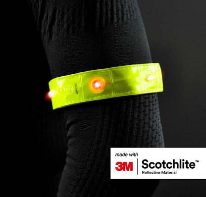 picture of person wearing LED armband on arm.